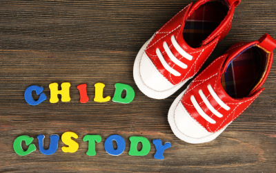 Child-Custody-Blog-960-×-540-px image of child's shoes with child custody words - when should you use professional private investigator surveillance services in a child custody case?